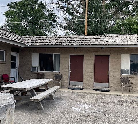 Parking to the right of this photo off the road and about 10 steps to your front door.