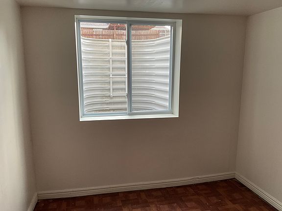 Basement bedroom with egress window