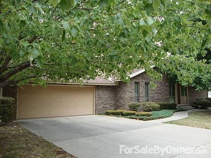 Front Exterior of Home
						:
						Landscaped with mature trees