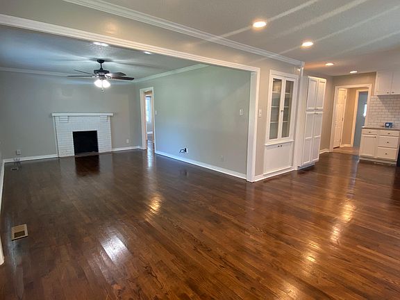 Gorgeous open floor plan. Hand finished original wood floors.