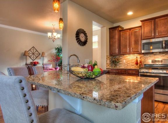 Slab Granite, Alder Shaker Cabinetry