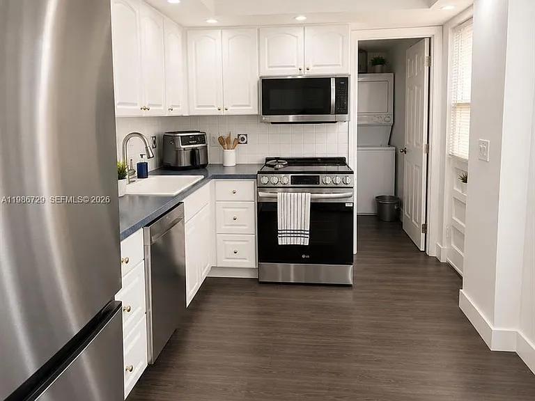 299 NW 52nd Ter #X — Photo 5