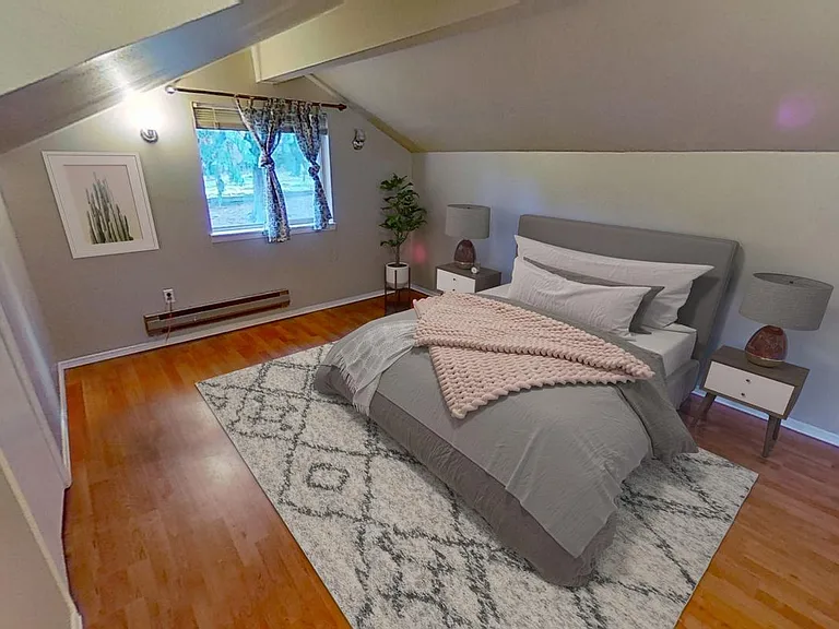 Bedroom 1. This image shows a virtually furnished space. Bedrooms come unfurnished.