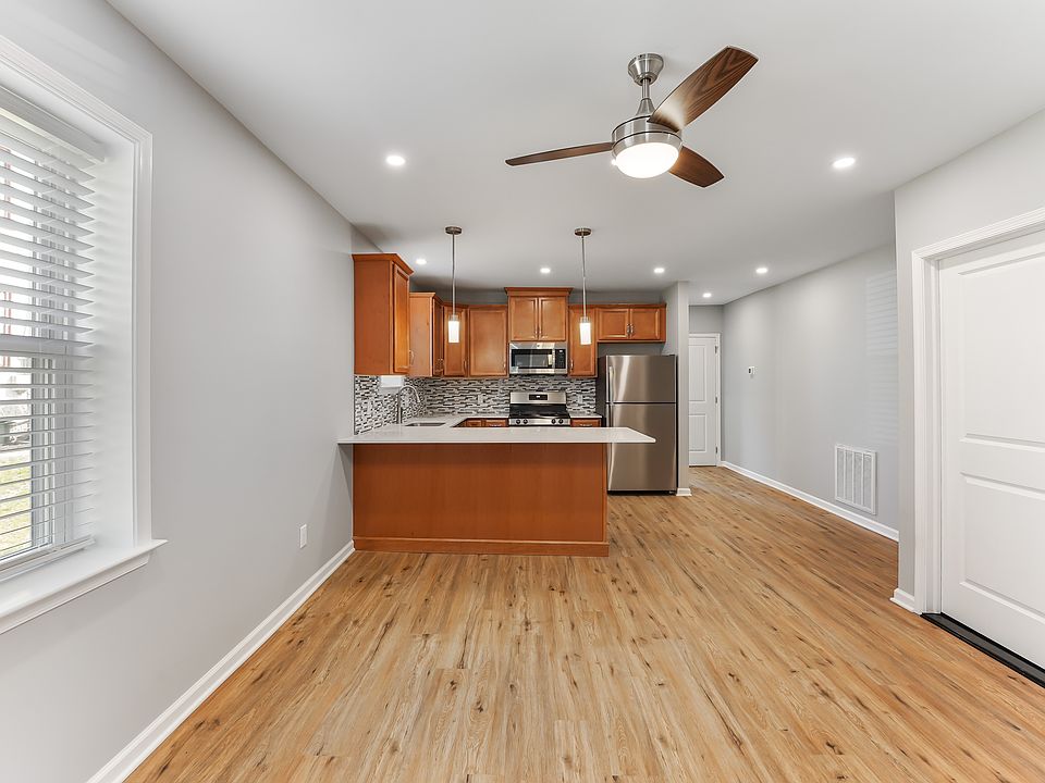 Granite counters, tile backsplash and stainless appliances