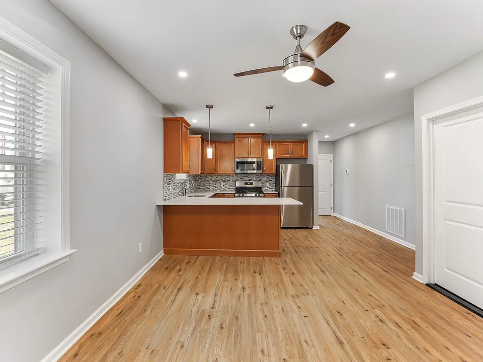 Granite counters, tile backsplash and stainless appliances