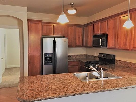 Kitchen with stainless steal appliances and granite countertops