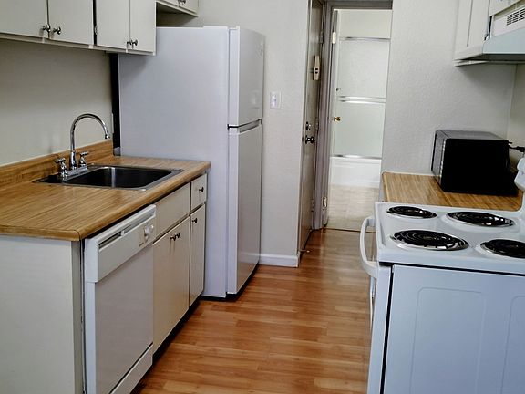 Kitchen appliance includes, Electric Range, Dishwasher, Refrigerator, Microwave and Pantry