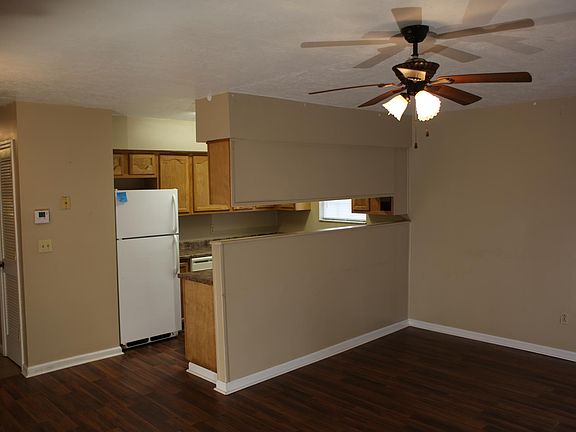 Kitchen opens to large Living Dining Area