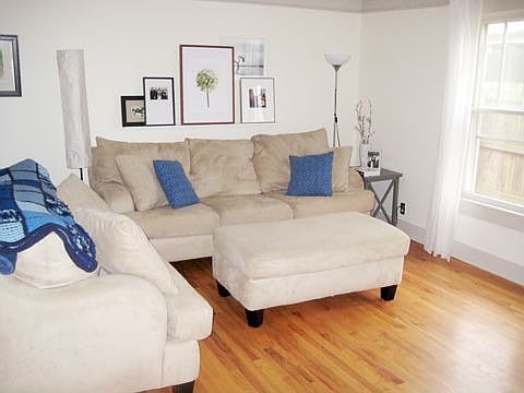 Spacious living room with hardwood floors