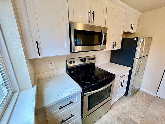 5th image of 12618 109th Ct NE APT H305