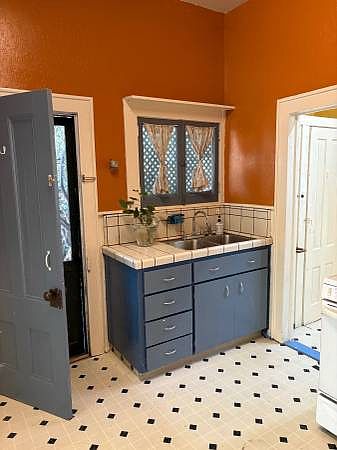 Kitchen that lead to open pantry room