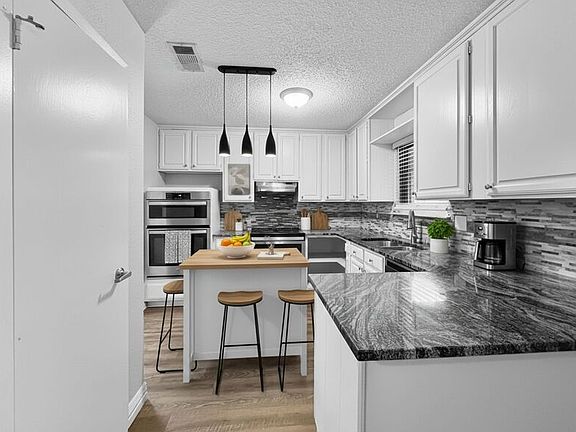 3rd image of 8802 Deerwood Dr
