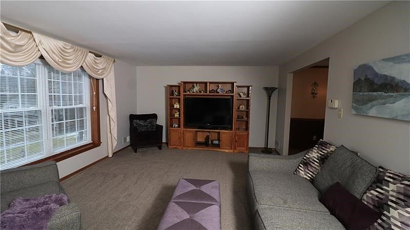 Huge formal living room will be appreciated when large gatherings come over, and at the holidays.  Plush new wall to wall and ne