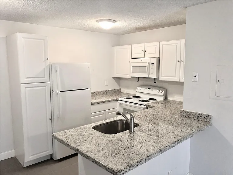 651 Lyons Rd #10104 — Photo 1
