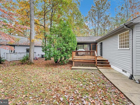 backyard walk from side load garage to rear deck