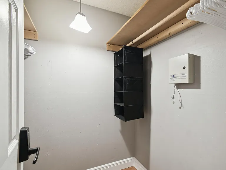 Across the hall your own master suite walk in closet