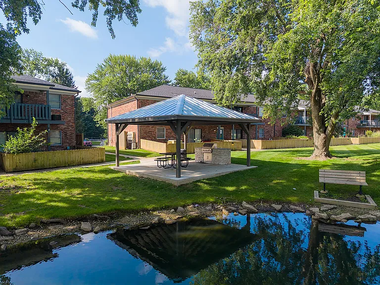 Pavilion with Lounge Near Community Pond