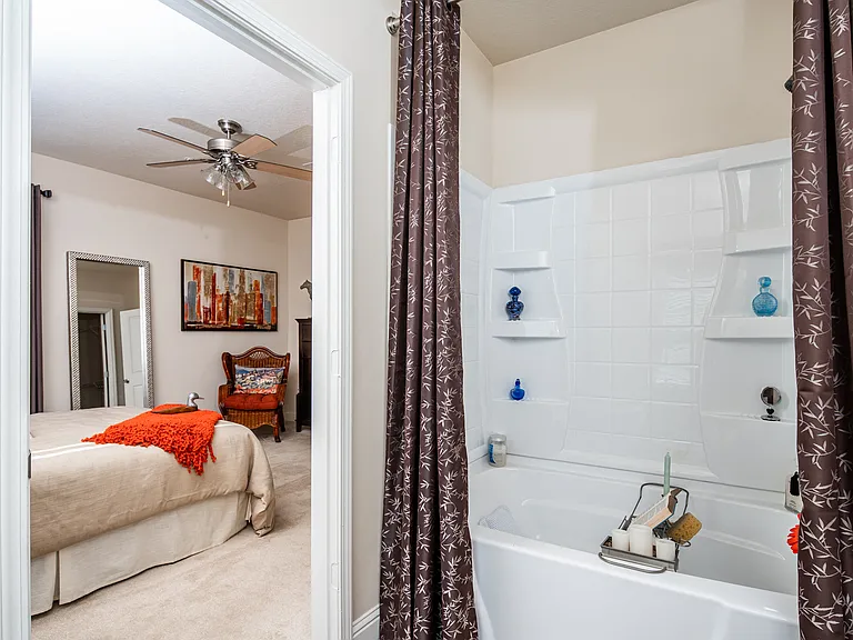 Looking from bathroom into master bedroom