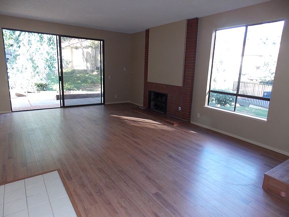 Living Room w/one of two Fireplaces.