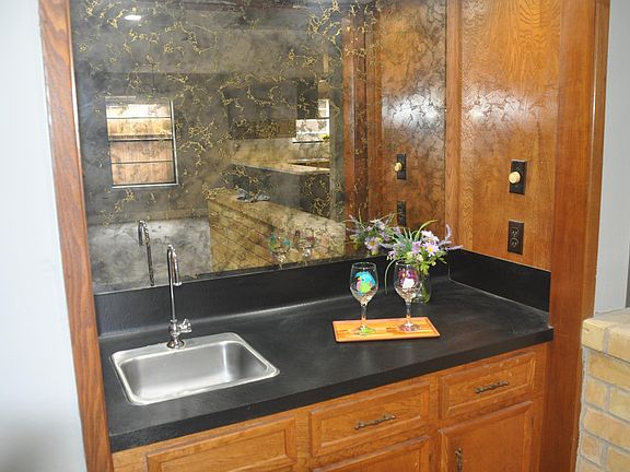 Enjoy a glass of wine at your new bar!