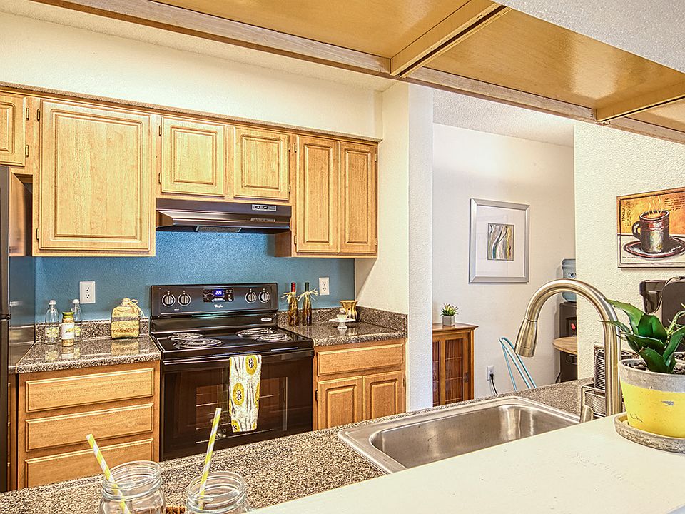 Black appliances and custom cabinets