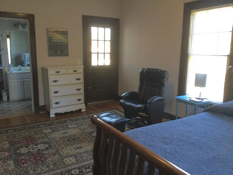 Master bedroom showing door to deck.