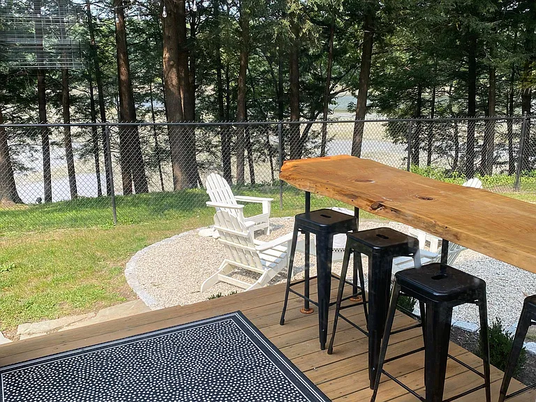 Deck with built in bar off living room