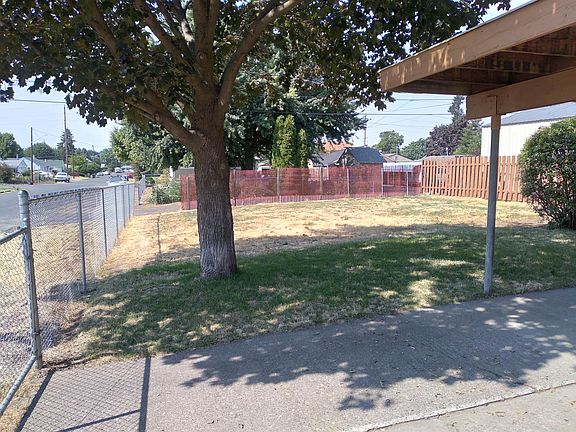 Back portion of fenced lot.