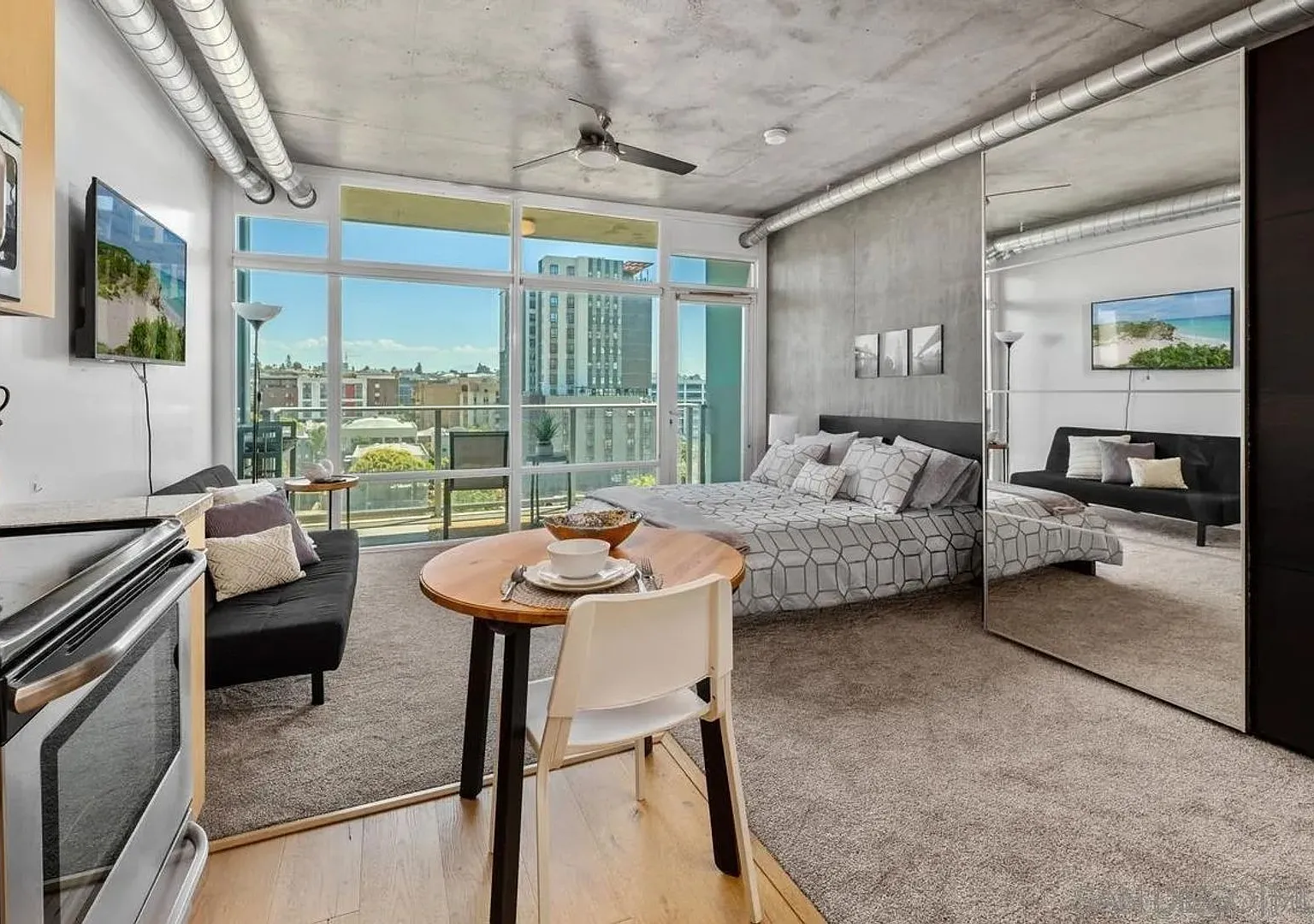 Stylish East Village Studio | Rooftop Amenities | Flexible Lease Options — Photo 1