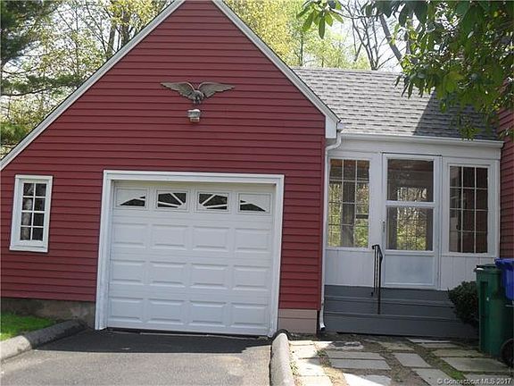An attached garage and a  b...