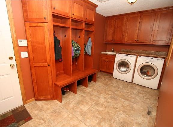Laundry / Mudroom features beautiful tile and Alder Lockers.