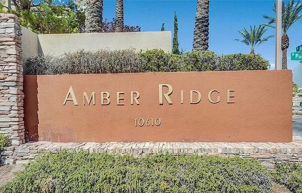 Sign welcoming residents to Amber Ridge Condominiums