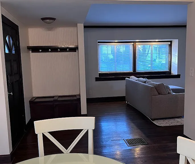 Drop Zone at the front door with a walk in closet behind it.