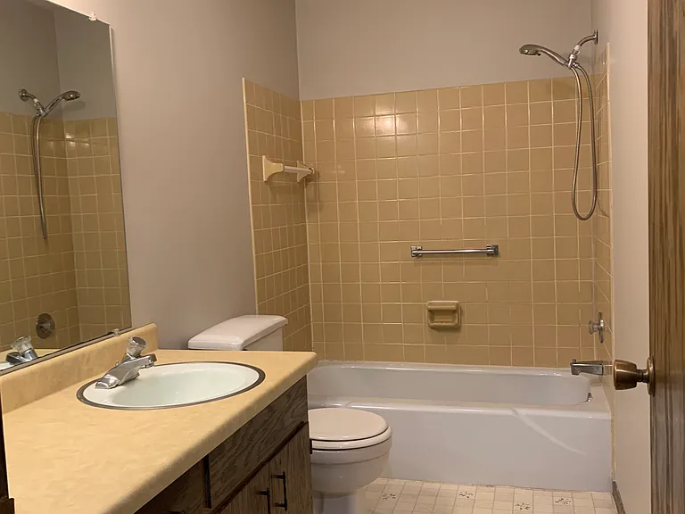 Bathroom with tub and shower