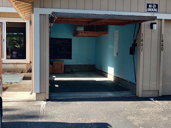 Two dedicated parking spots, and a third is available in the common area parking spots. Garage has electricity for charging cars or bikes.