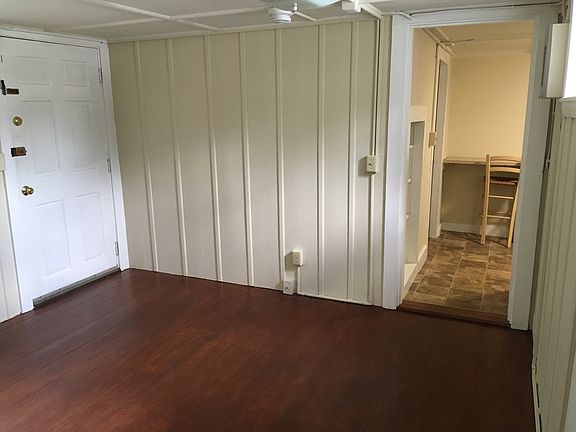 LR (looking toward Kitchen); front door to the left