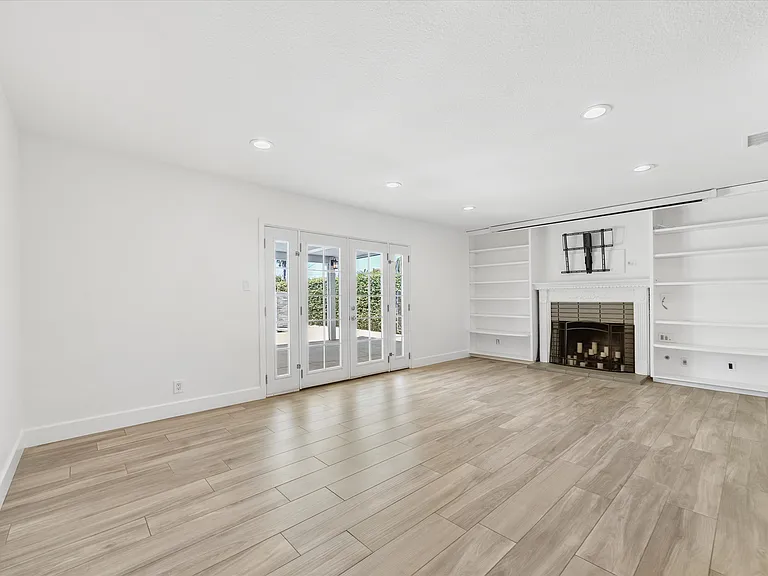 Living Room looking towards doors to backyard and pool area