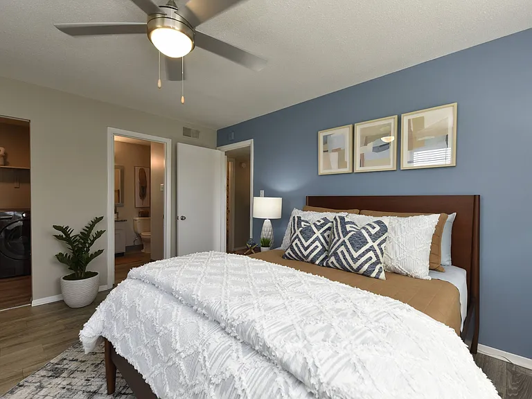 Bedroom with hardwood-style flooring