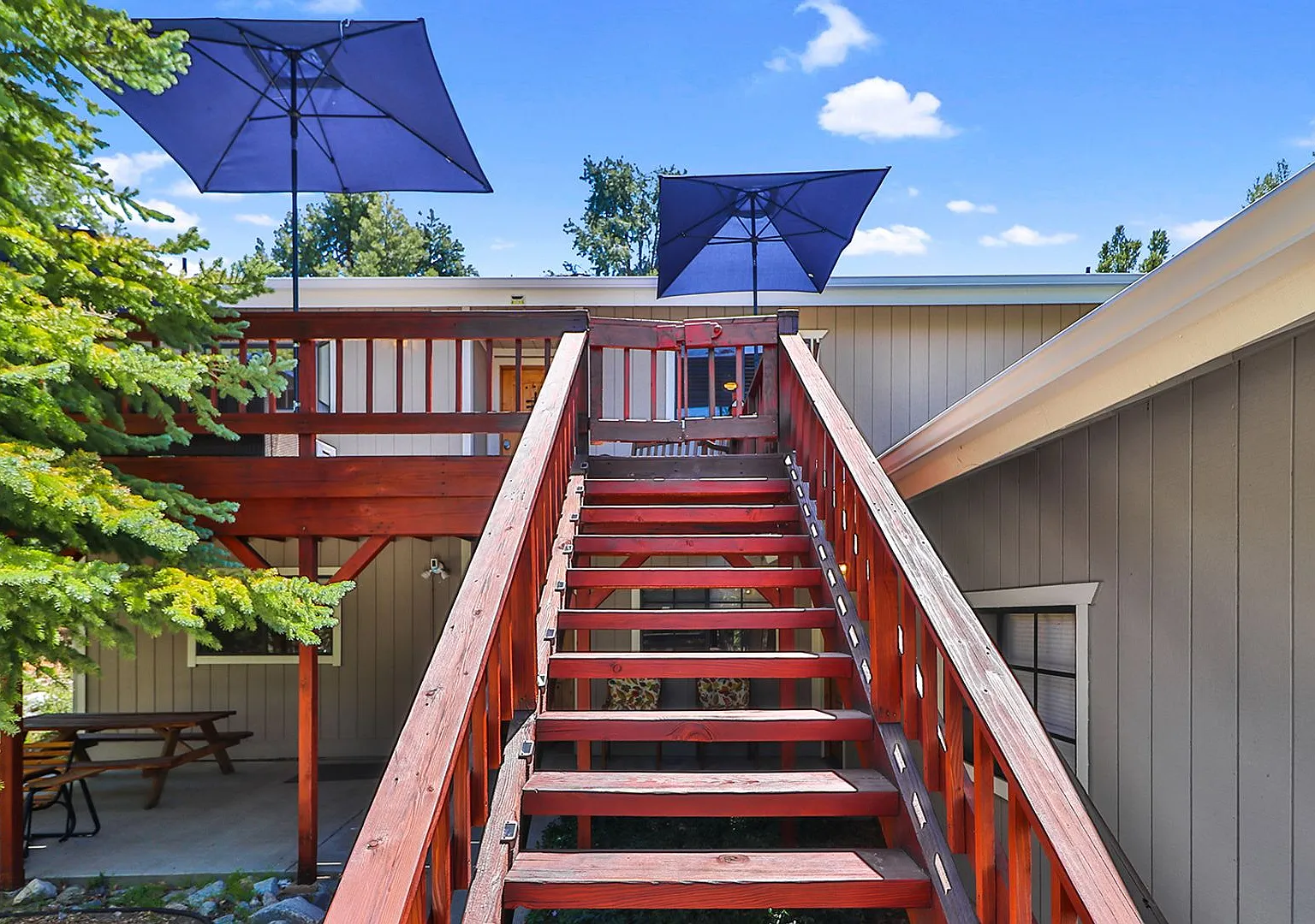 Charming 3 Bed Mountain Retreat | Wood Beams, Fireplace & Deck — Photo 2