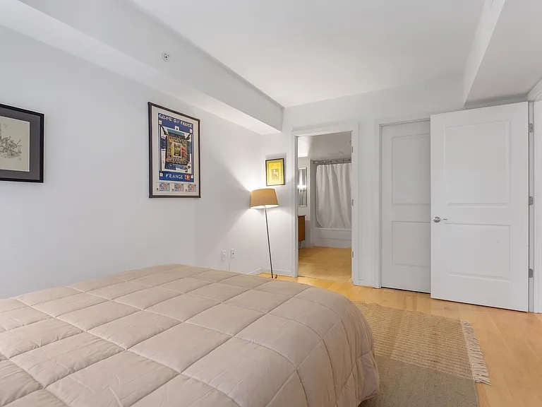 Minimalist decor, and warm hardwood floors throughout.