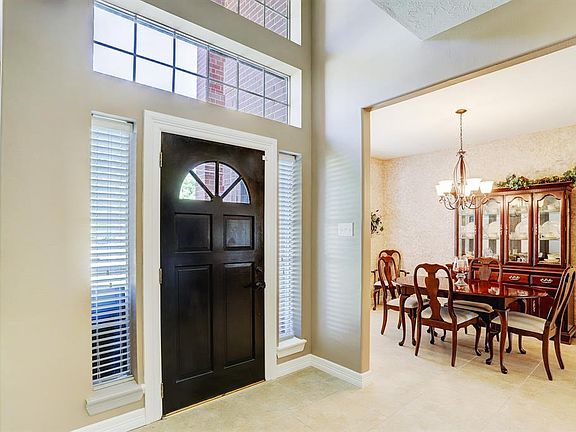 Another view of the light and bright formal entry.