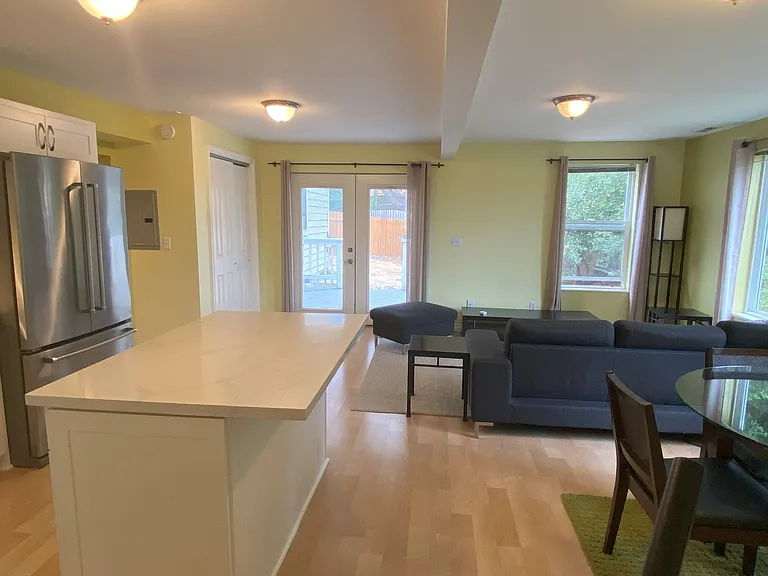 Living Room Kitchen and Dining Space View 2 Open Floor Concept
