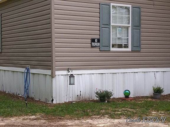 Front at drive, faces north
