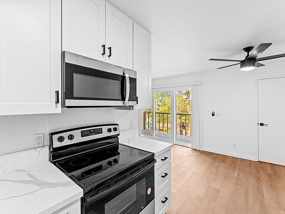 Inviting open kitchen layout that seamlessly integrates with the living and dining area.