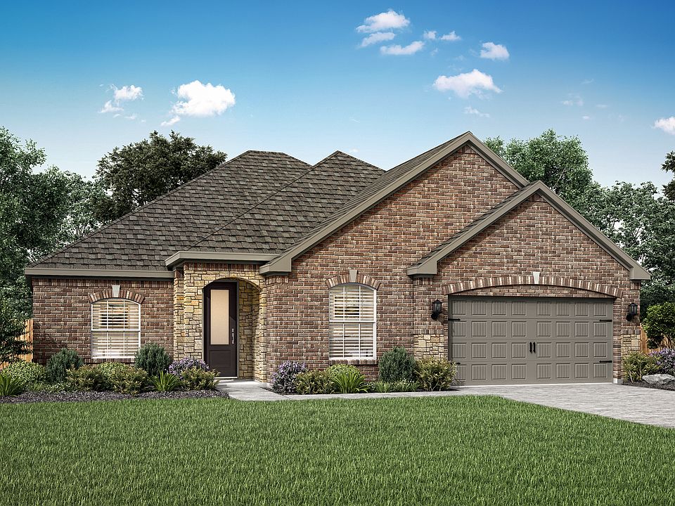 The Dockery is a single story home with brick and stone.