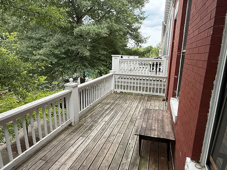 Enjoy chatting with friendly neighbors from your upstairs deck.