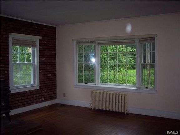 Bay window facing front of home in living room.