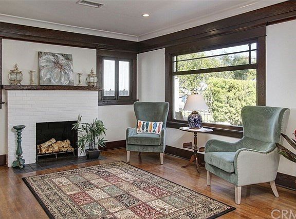 Warm and cozy living room with large beautiful window.