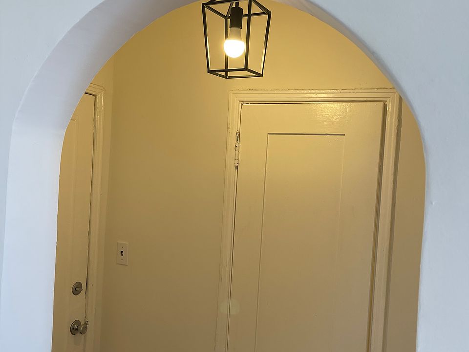 Formal entry hall has a coat closet 203