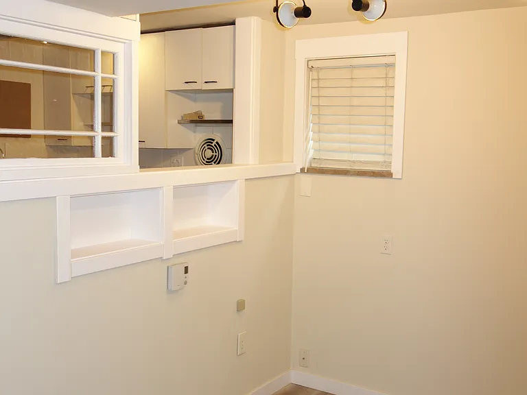 Living area looking into kitchen